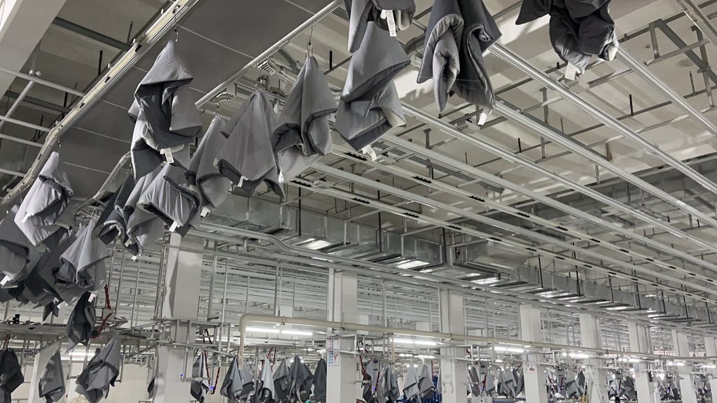 CleverMax hanger system carrying garments at the NewSega Home Textiles workshop