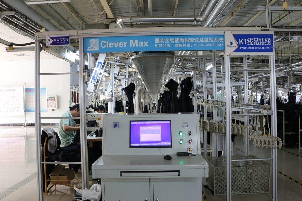 Hanger System for Outerwear & Suits — CleverMax hanger system on the production floor