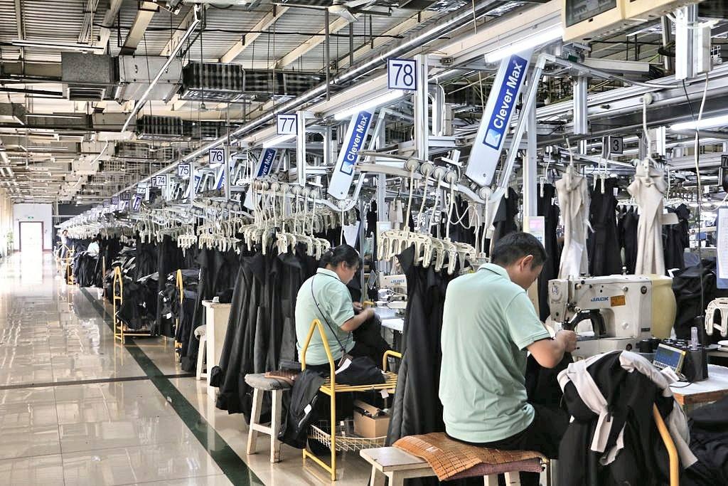 Hanger System for Outerwear & Suits — CleverMax hanger system on the production floor